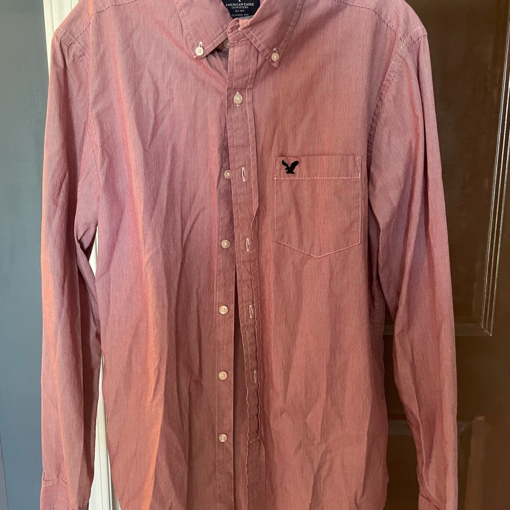 Men’s burgundy button up.
